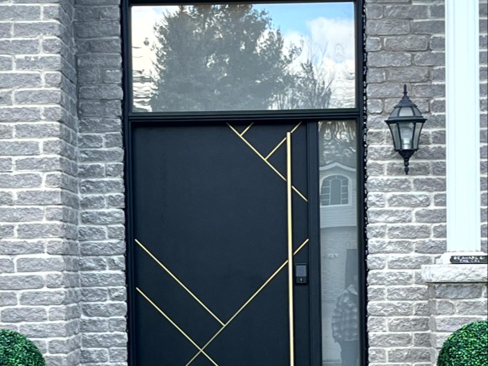 Modern Black Entry Door with Gold Accents
