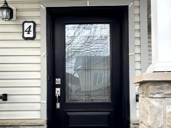 Black Entry Door with Decorative Glass