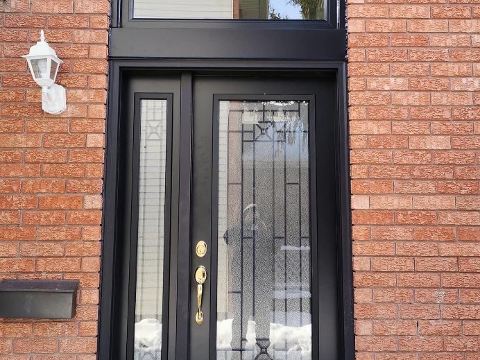 Black Entryway with Transom and Decorative Glass